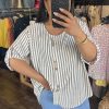 Blouse rayée à boutons en bois