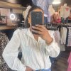 Blouse blanche à sequins
